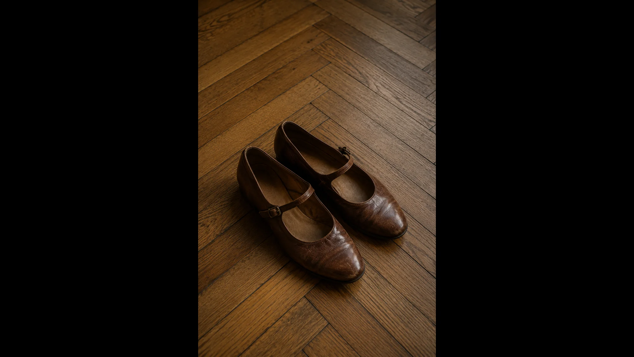 old comfortable elegant old fashion Mary brown leather shoes on wooden floor